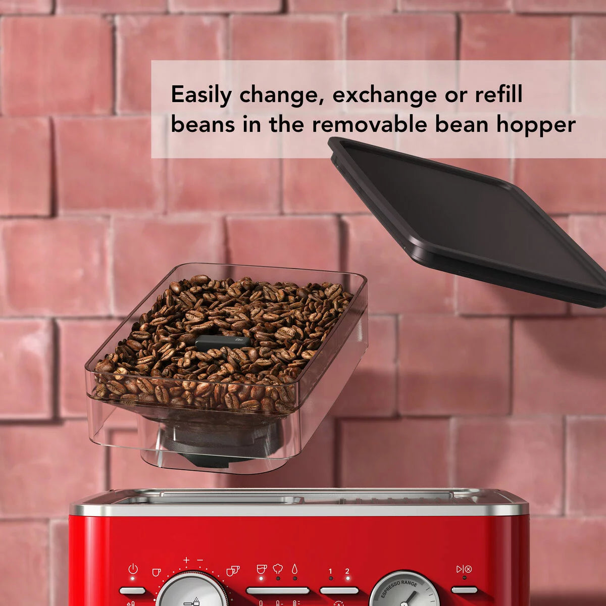 KitchenAid Candy Apple red semi automatic espresso machine with built in burr grinder, 58mm portafilter, and stainless steel milk pitcher on a clean kitchen countertop.