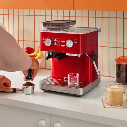 KitchenAid Semi Auto Espresso Machine 5KES6551BCA with integrated burr grinder brewing fresh espresso and milk-based coffee drinks.