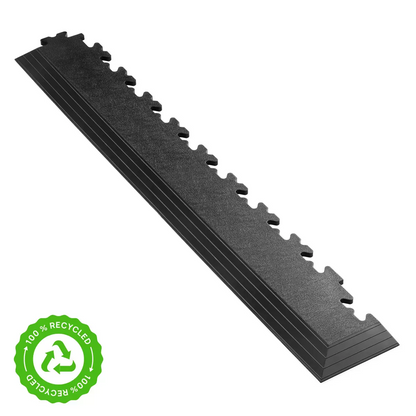 Black recycled PVC Klikflor RX500 corner ramp tile showing a 90-degree angled edge transition for garage floor tile installation.