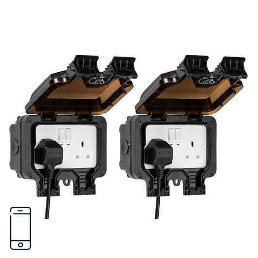 A pair of Knightsbridge smart outdoor sockets with grey weatherproof covers mounted on an exterior brick wall.