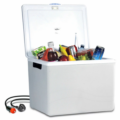 Sleek grey injection-molded Koolatron 34L electric cooler standing upright as a mini fridge on a wooden campervan counter with drinks neatly organized inside.