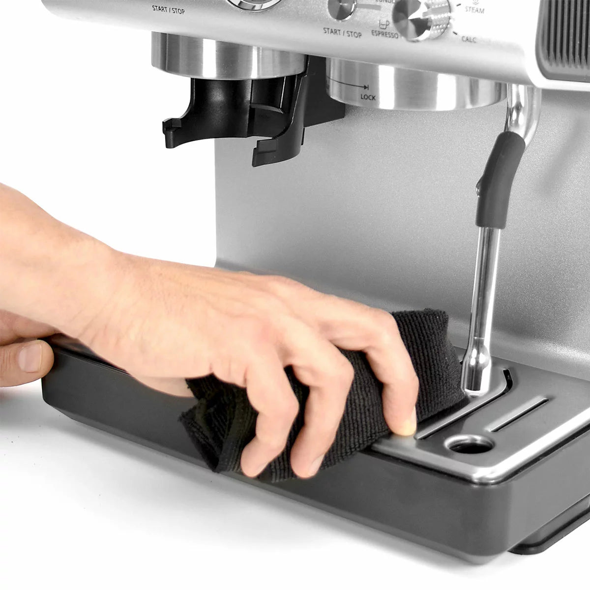 Krups XP801TG0 espresso coffee machine with grinder black and stainless steel making fresh barista-style coffee at home.