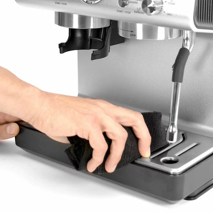 Krups XP801TG0 espresso coffee machine with grinder black and stainless steel making fresh barista-style coffee at home.