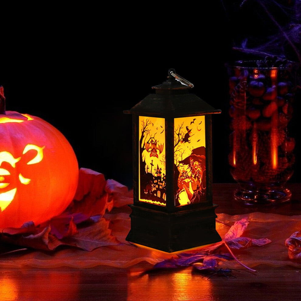 An acrylic LED Halloween square wind light featuring a soft glow and a metal hanging ring displayed on a festive tabletop