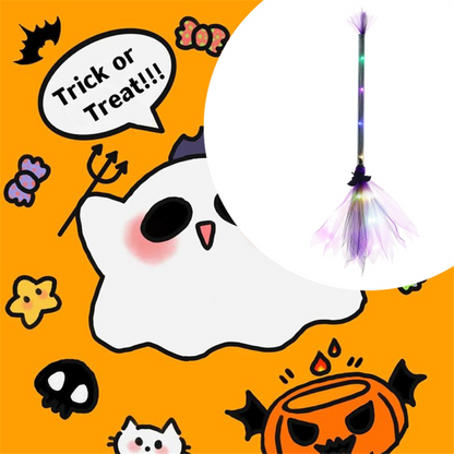 An adjustable light-up LED witch broom wrapped in gauze and ribbon glowing against a dark outdoor background.