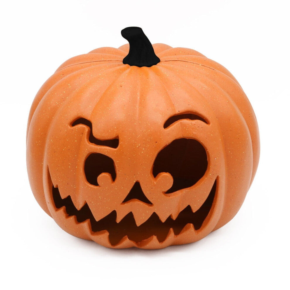 A 9.05x7.48in resin LED pumpkin and hooded skull lantern glowing eerily on a dark party display table.