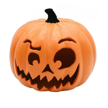 A 9.05x7.48in resin LED pumpkin and hooded skull lantern glowing eerily on a dark party display table.