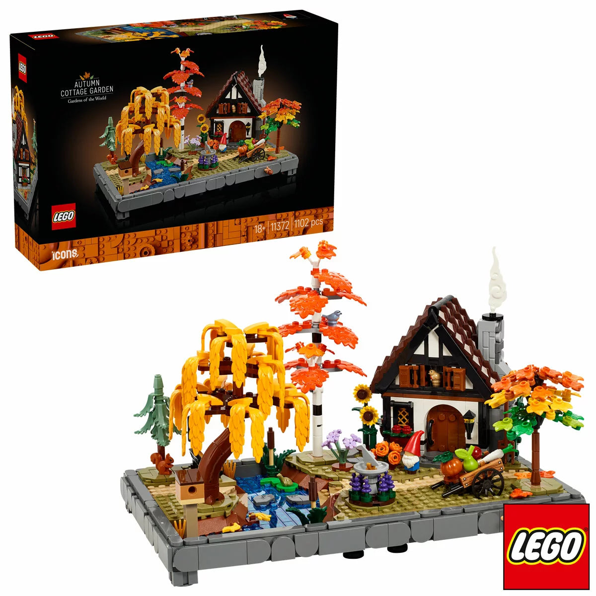Three-quarter angle view of the LEGO Icons Autumn Cottage Garden set displaying orange maple trees, a stone stream, bird figures, and an openable cottage on a wooden table.