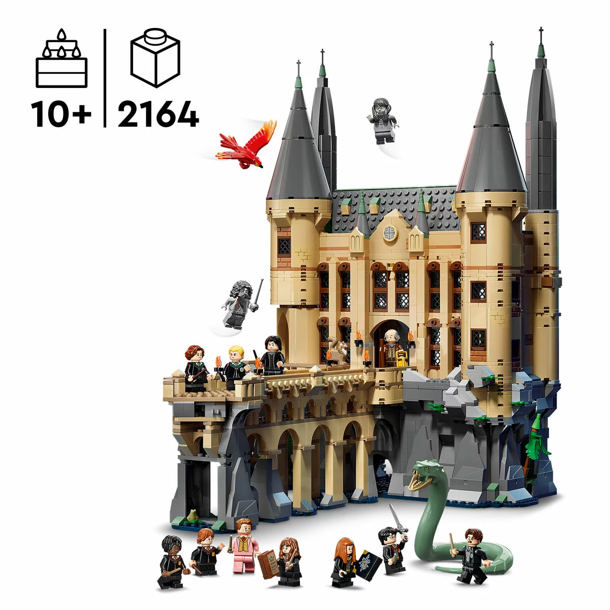 LEGO Harry Potter Hogwarts Castle East Wing model displayed on a table, featuring the bathroom slide, detailed interior rooms, and the Basilisk figure.