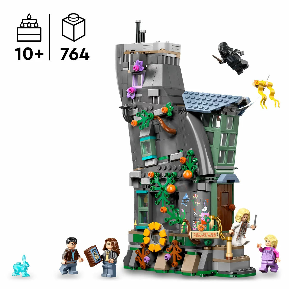 Front three-quarter angle of the eccentric cylindrical LEGO Harry Potter Luna Lovegood's House 76467 set displayed with five minifigures and a glowing light brick effect on a plain background.
