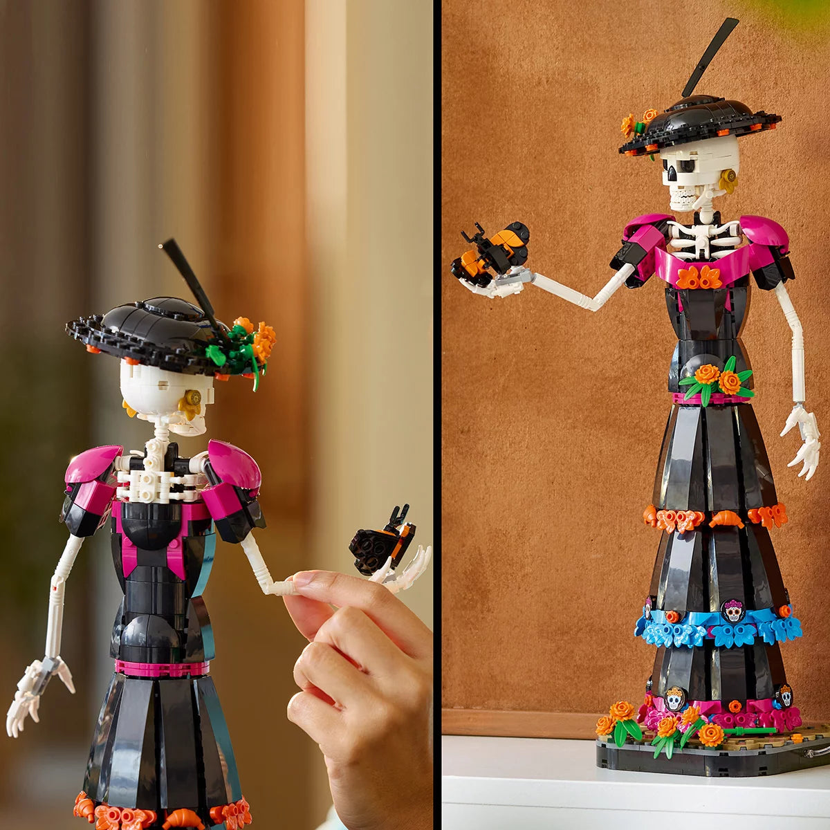 LEGO Ideas La Catrina model figure standing on a marigold-covered base wearing a wide-brimmed hat with colorful skull prints and orange flowers.