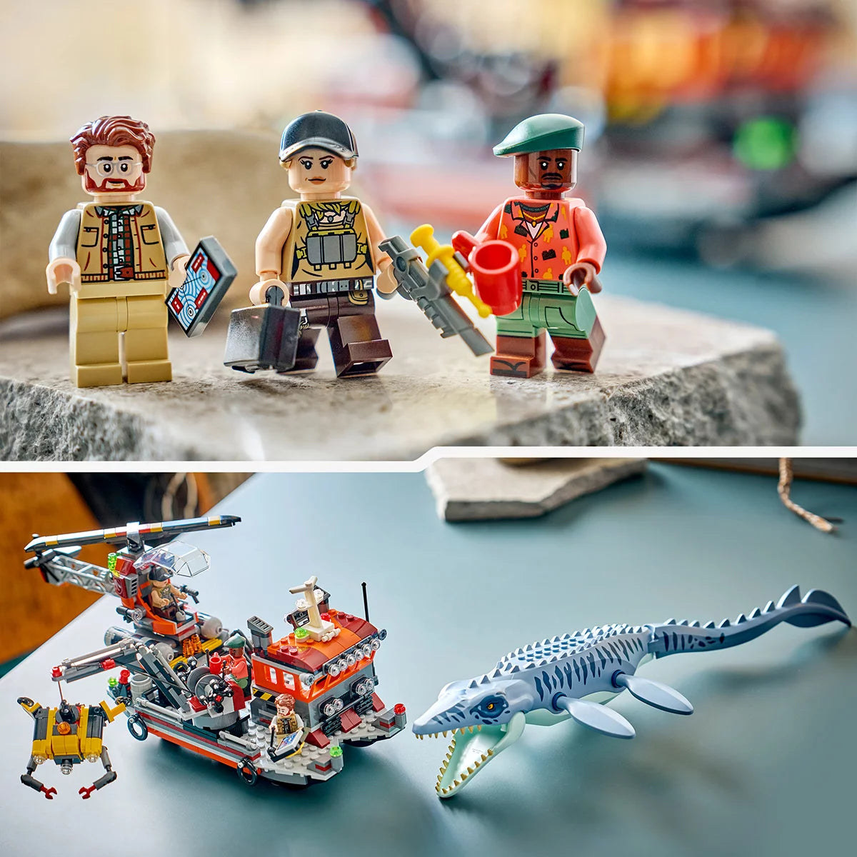 LEGO Jurassic World Mosasaurus model set 77983 featuring a large blue-grey dinosaur attacking a cargo boat with helicopter and three minifigures on a plain background.