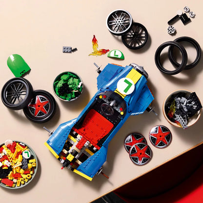Three-quarter overhead shot of the large built blue and yellow LEGO 72050 Mach 8 racing kart with Luigi sitting inside, angled on a black display stand.
