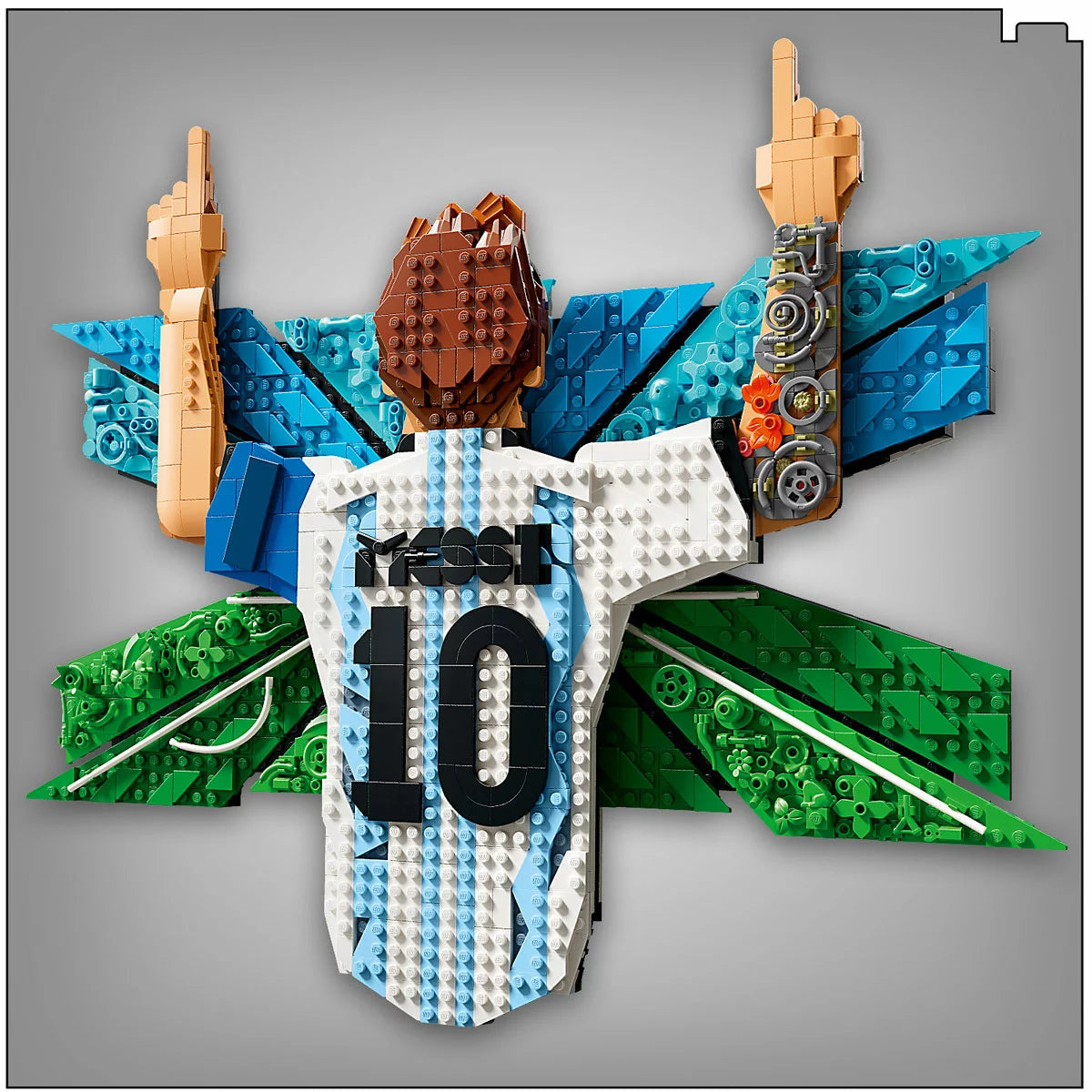 Front view of the built LEGO 43018 3D wall art portrait showing Lionel Messi in a blue and white striped jersey pointing at the sky.