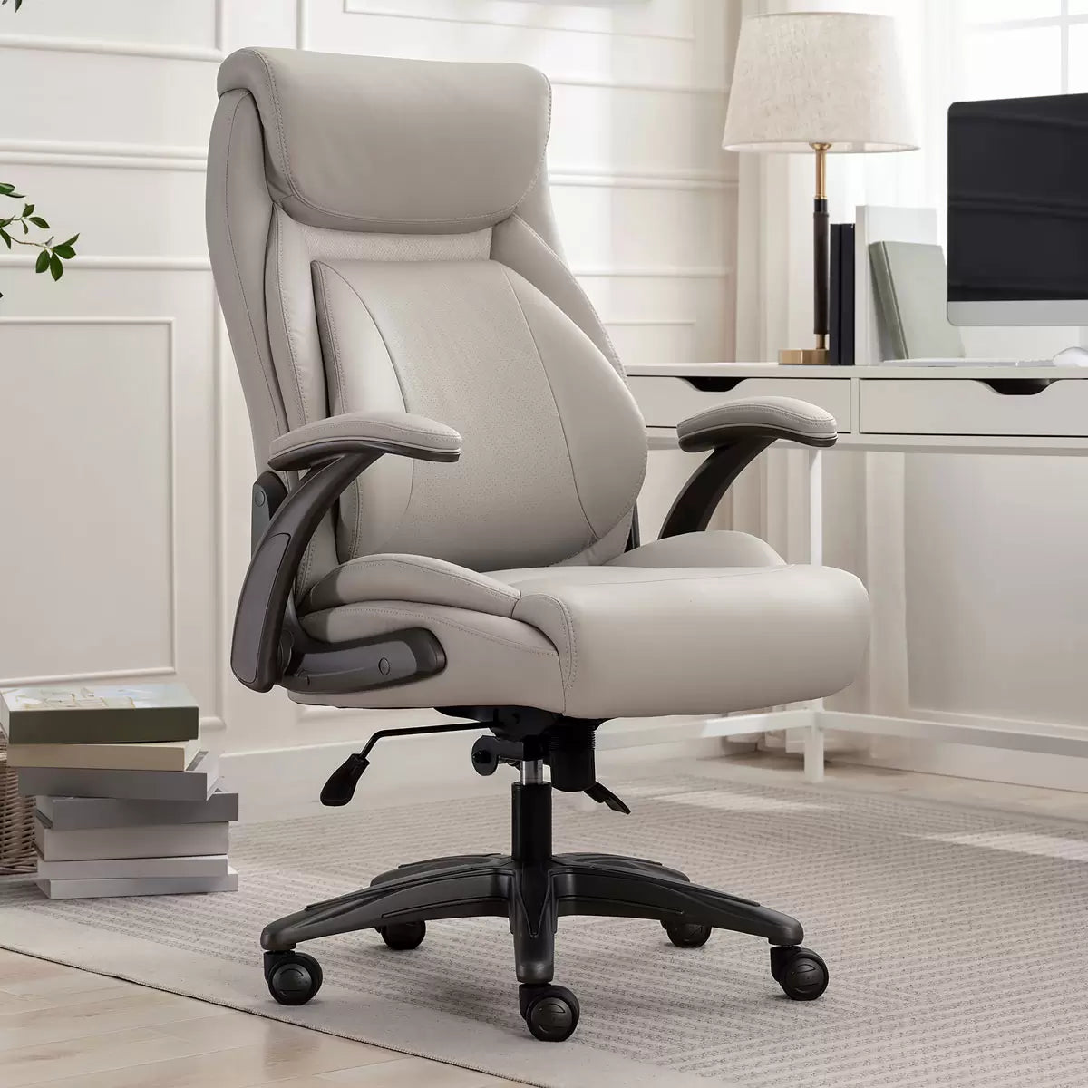 Beige La-Z-Boy manager office chair with air lumbar support and flip-up arms for ergonomic seating comfort