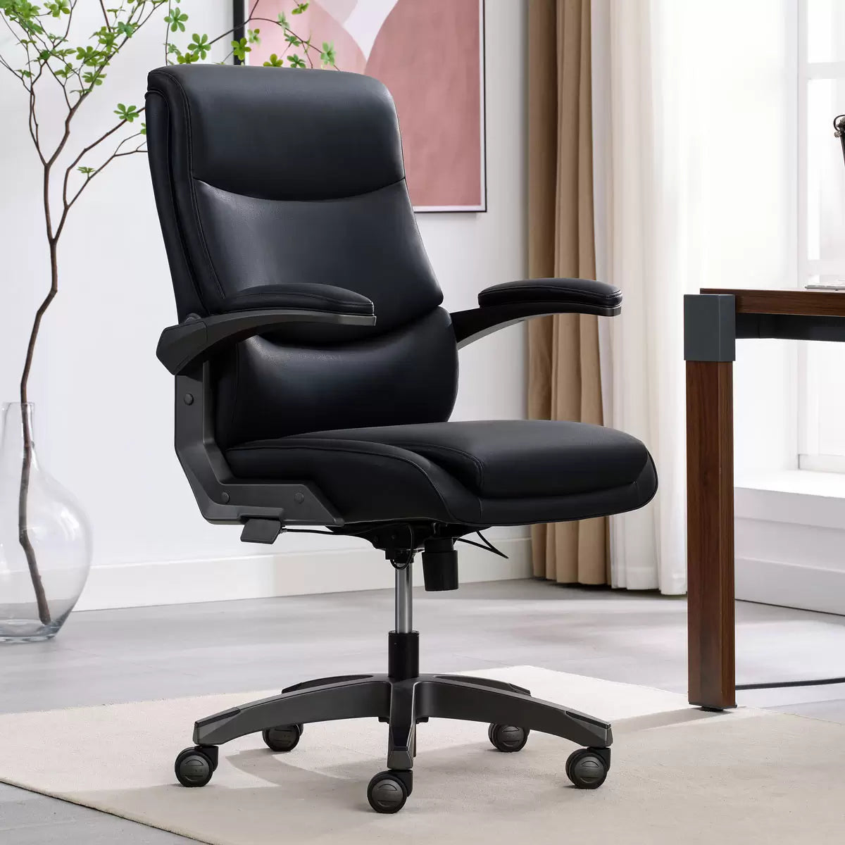 La-Z-Boy Manager’s Office Chair with flip-up arms, ergonomic lumbar support, and adjustable height for office use