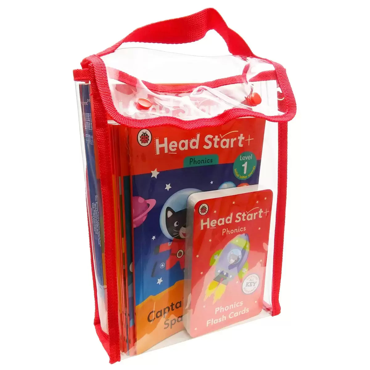 Flat lay view of the Ladybird Head Start 18 book and 52 flashcard set spread out on a white surface showing colorful phonics, maths, and handwriting covers.