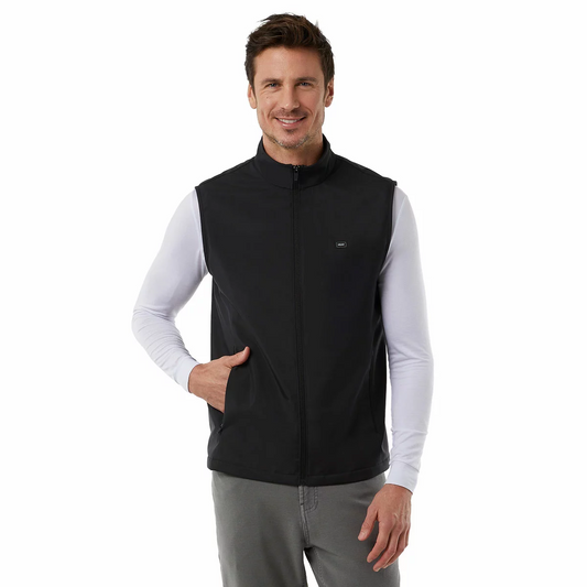Black 32 Degrees heated vest laid flat displaying the glowing LED power button on the chest and the compact 10,000mAh battery pack resting nearby.