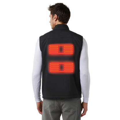 Black 32 Degrees heated vest laid flat displaying the glowing LED power button on the chest and the compact 10,000mAh battery pack resting nearby.