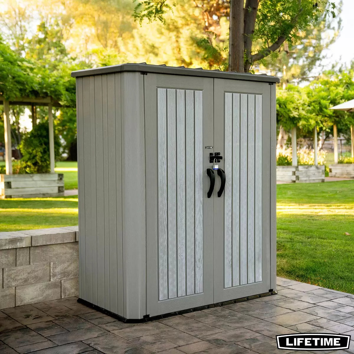 Lifetime 2060L Rough Cut vertical storage shed with wood-grain texture and doors open, showcasing interior shelving organised with garden tools.