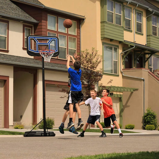 Lifetime 44-inch portable basketball hoop with black shatterproof backboard and orange steel rim set up on a concrete driveway.