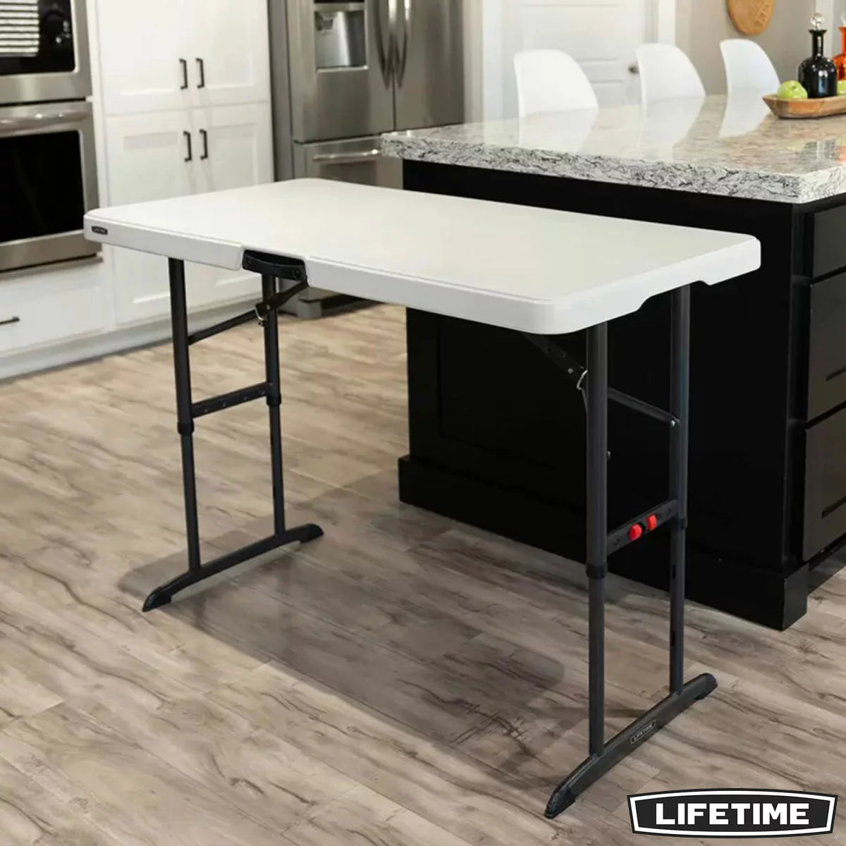 Front angle view of the Lifetime 4ft adjustable table with its almond top and bronze steel legs set at medium height on an outdoor patio.