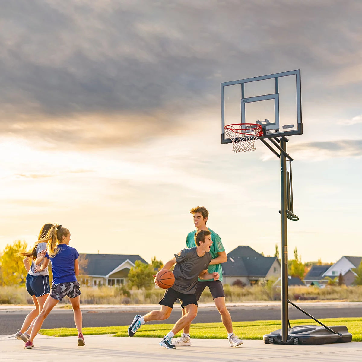 Lifetime 52 Inch Power Lift XI Portable Basketball Hoop System with adjustable height mechanism, durable backboard, and portable outdoor basketball goal.