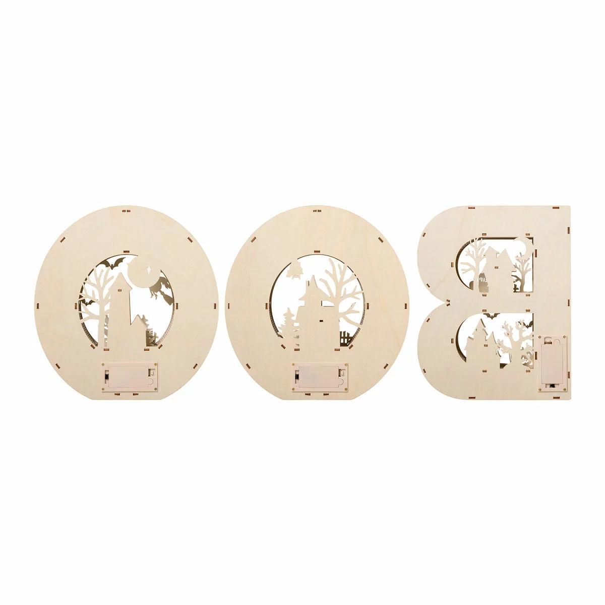 Set of three large illuminated wooden BOO letters featuring detailed laser-cut Halloween scenes emitting a warm LED glow on a dark wooden mantle shelf.