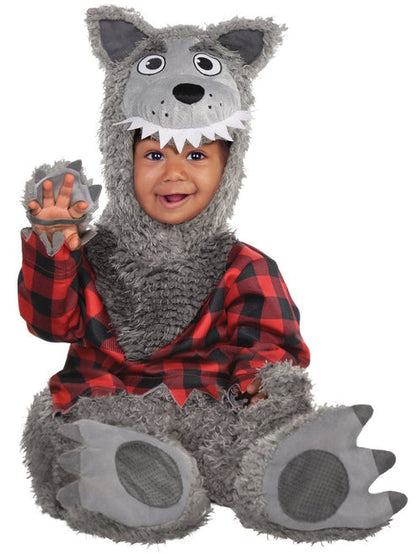 Front view of an infant wearing a fluffy grey wolf costume jumpsuit with an attached red plaid shirt, plush wolf ear hood, and matching grey booties against a neutral backdrop.
