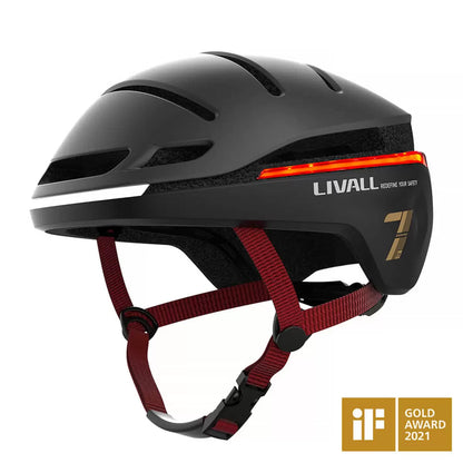 A side-angle profile shot of the Livall EVO21 smart bike helmet in black, showcasing the integrated LED rear lighting panel and aerodynamic ventilation vents.