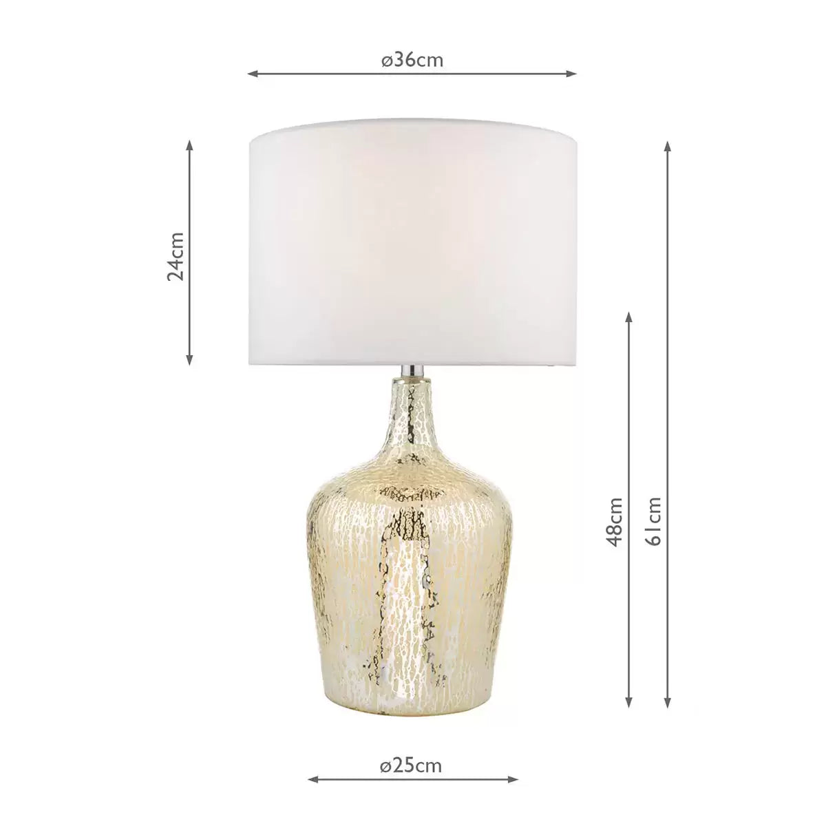 A Lolek silver glass table lamp with a glowing, textured mercury finish base and an ivory faux silk drum shade illuminating a cozy bedside table environment.