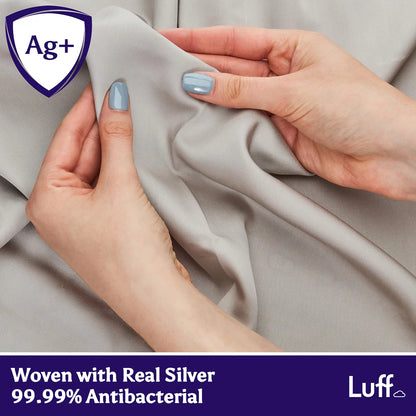 Close up view of Luff SilverLining 1000TC organic bamboo pillowcase fabric showing its smooth lustrous silk texture