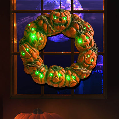 A 50cm multicolor luminous Halloween pumpkin wreath with twisted carvings and glowing eerie details hanging on a dark door.