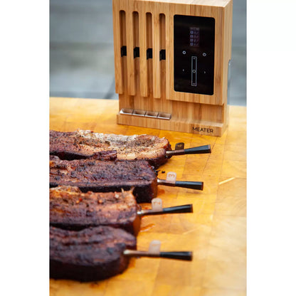 The MEATER Block 4-probe wireless thermometer system in its premium honey-coloured finish.