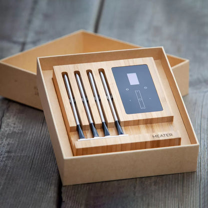 The MEATER Block 4-probe wireless thermometer system in its premium honey-coloured finish.
