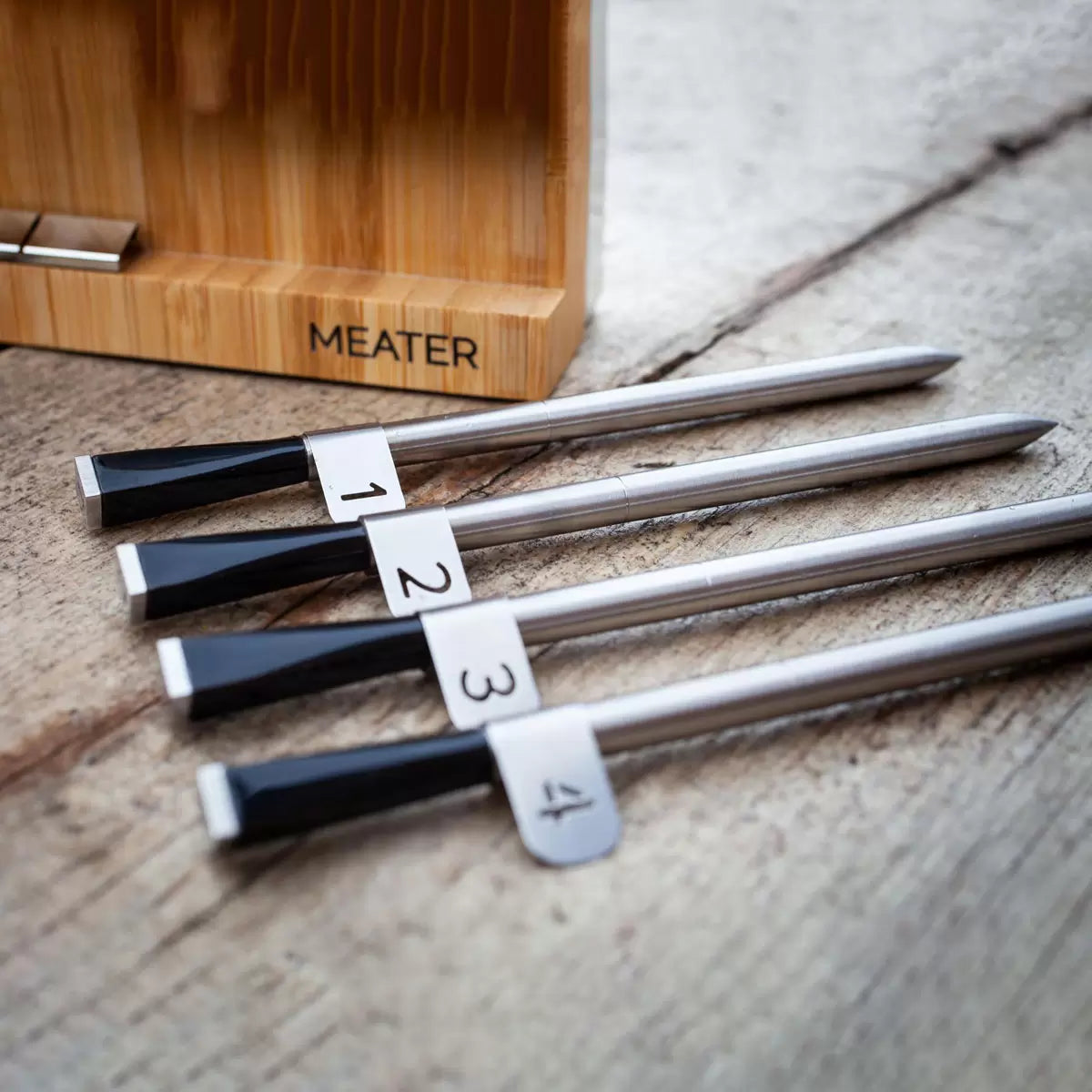 The MEATER Block 4-probe wireless thermometer system in its premium honey-coloured finish.