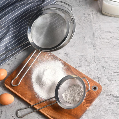 MIU 3-piece stainless steel fine mesh strainer set shown in various sizes on a granite countertop.