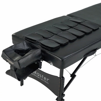 The Master Massage Monaco Airwave table showcased in a professional setting with its integrated air control console, demonstrating the sleek, ergonomic design and high-quality upholstery.