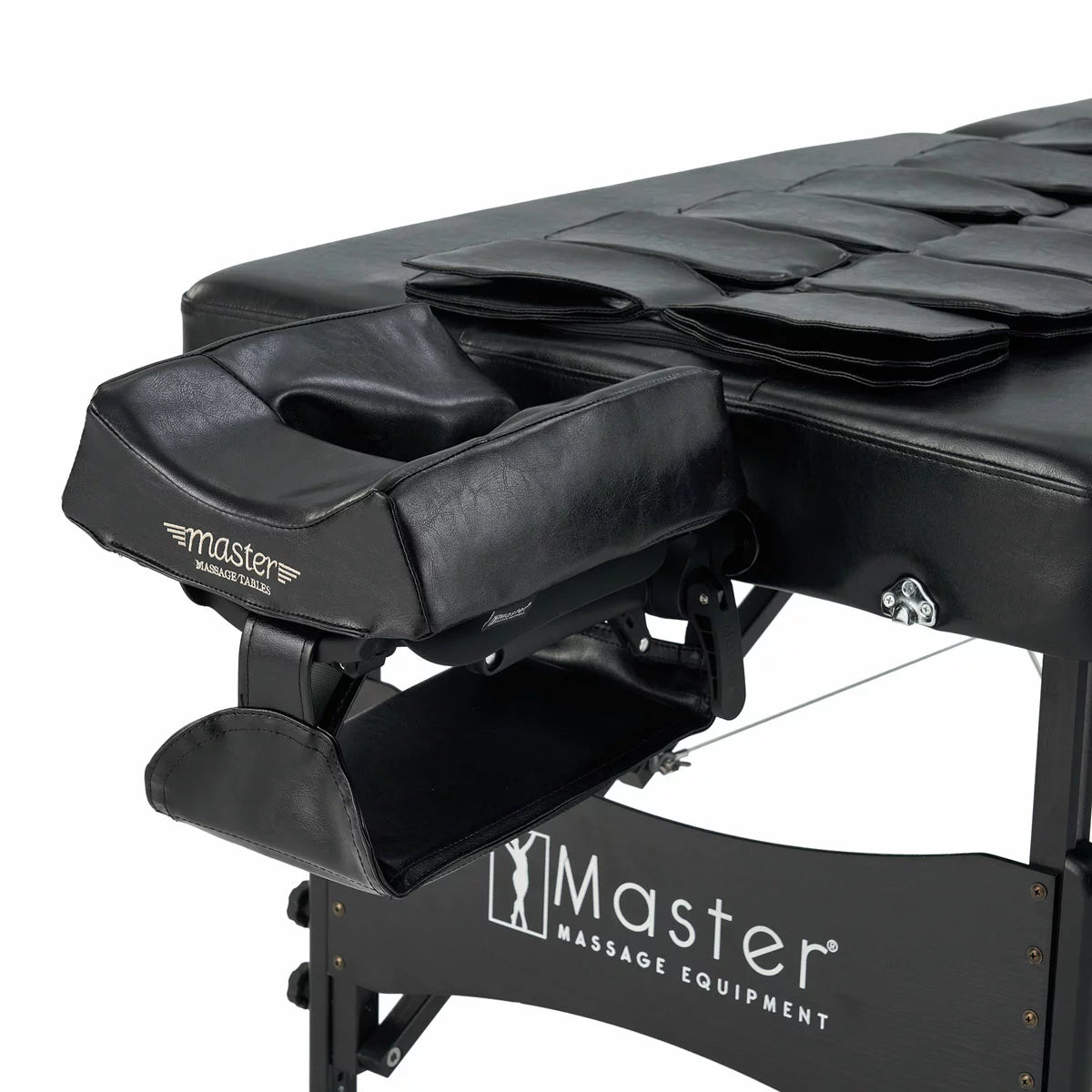 The Master Massage Monaco Airwave table showcased in a professional setting with its integrated air control console, demonstrating the sleek, ergonomic design and high-quality upholstery.
