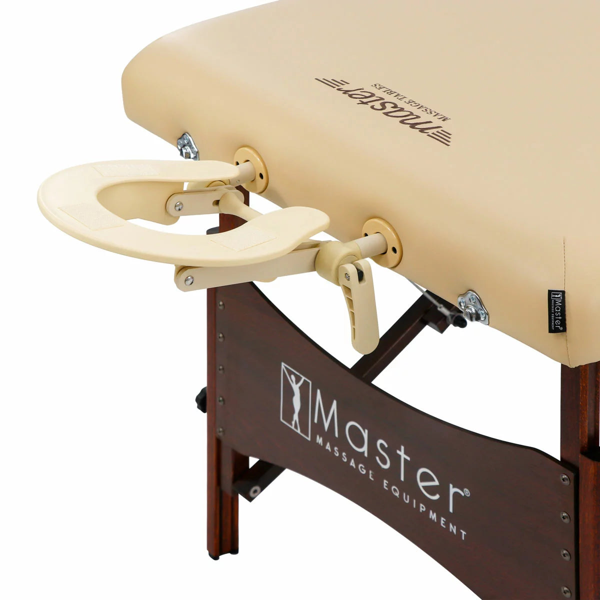 The Master Massage Paradise 71cm portable table in cream, shown in a professional setting with its included accessories, demonstrating its stable wood frame and ergonomic design.