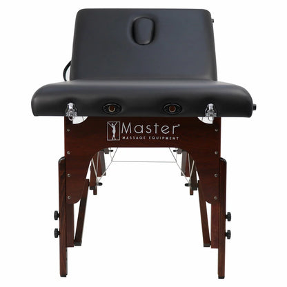 The Master Massage SomeRest table featuring its adjustable liftback in a raised position, displayed in a bright, modern studio with its included face cradle and carrying case nearby.