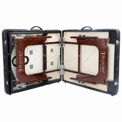 The Master Massage SomeRest table featuring its adjustable liftback in a raised position, displayed in a bright, modern studio with its included face cradle and carrying case nearby.