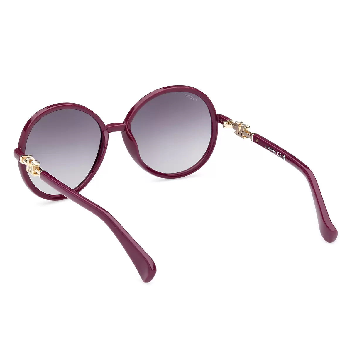 A detailed front-facing shot of the MaxMara MM0065 75B sunglasses with a striking 75B color finish, displayed against a clean, bright studio backdrop.