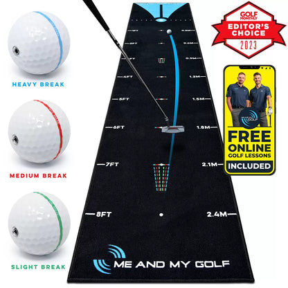 Black nylon Me and My Golf 11ft putting mat rolled out flat on a hardwood floor, featuring clear blue alignment markings and three blue-accented weighted training balls.