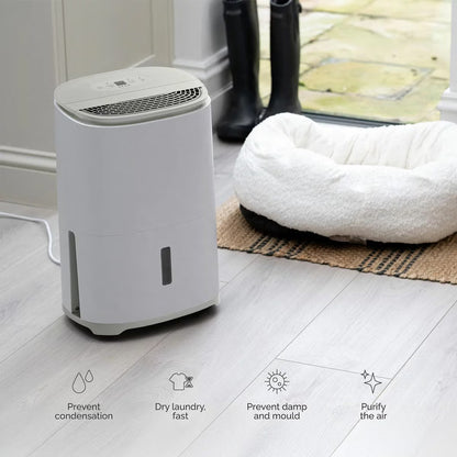 Front view of the sleek MeacoDry Arete One 10L Dehumidifier & Air Purifier in a neutral Warm Pebble finish sitting flush against a light grey wall.