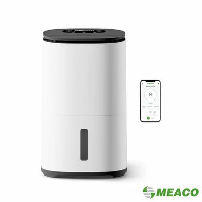MeacoDry Arete Two 25L Dehumidifier and Air Purifier in charcoal finish with digital LCD display standing on dark hardwood flooring in a spacious living room.