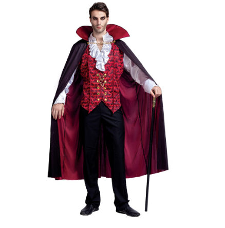 Front view of a man wearing the Spooktacular Creations Deluxe Renaissance Vampire costume featuring a dramatic red and black collared cape, detailed jabot, vest, and holding a prop vampire cane.