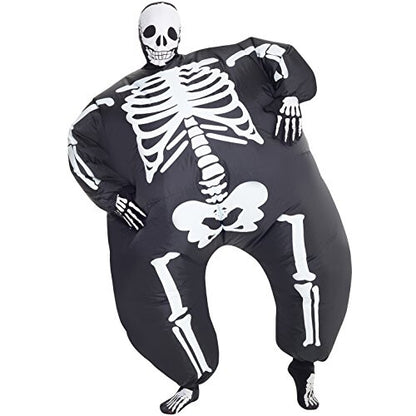 Front view of a man wearing the inflated Morph black and white skeleton MegaMorph costume standing in a brightly lit party setting.