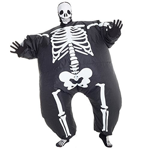 Front view of a man wearing the inflated Morph black and white skeleton MegaMorph costume standing in a brightly lit party setting.