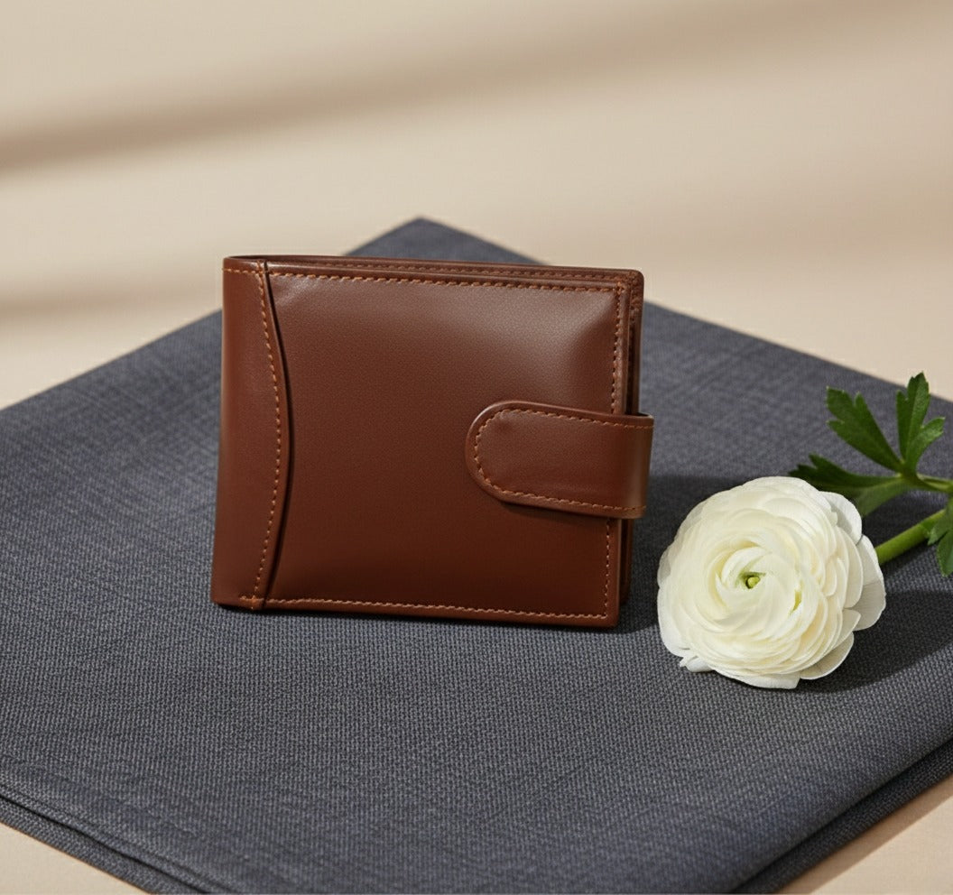 Ultra slim brown 100% genuine leather men's wallet laid out on a clean surface showing neat edge stitching and leather-lined card slots.